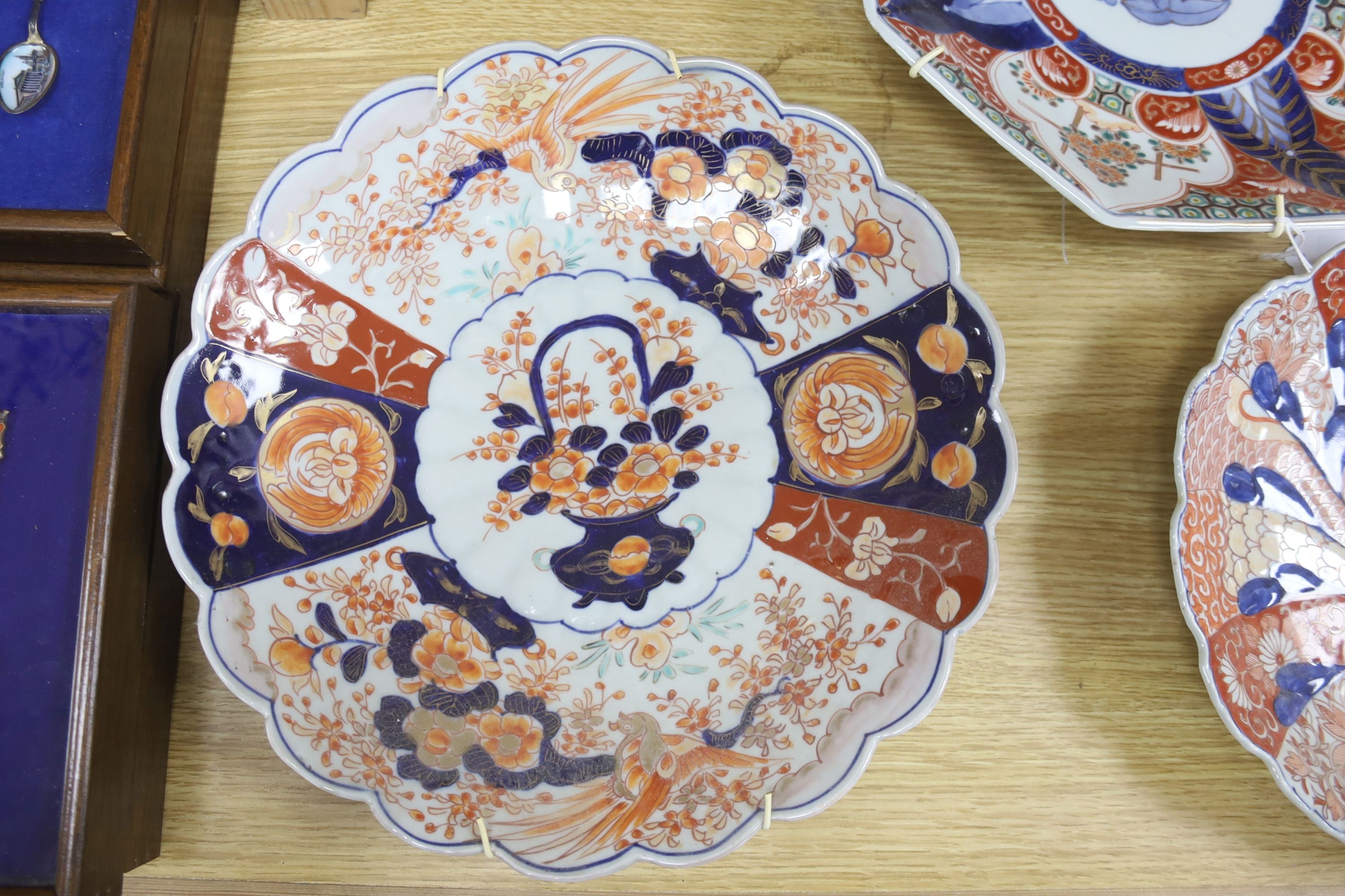 Seven various Japanese Imari dishes, late 19th century, 29.5 to 30.5cm wide